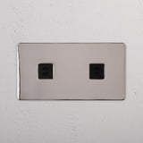 Zwei-Port-USB-Ladezubehör: Doppel-USB-Netzteil – Poliertes Nickel + Schwarz – auf weißem Hintergrund
